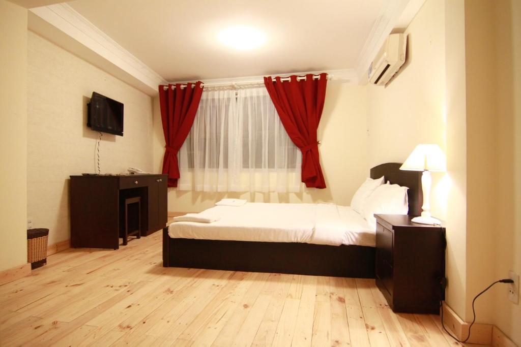 Koniko Backpackers Hostel Хошимин Номер фото