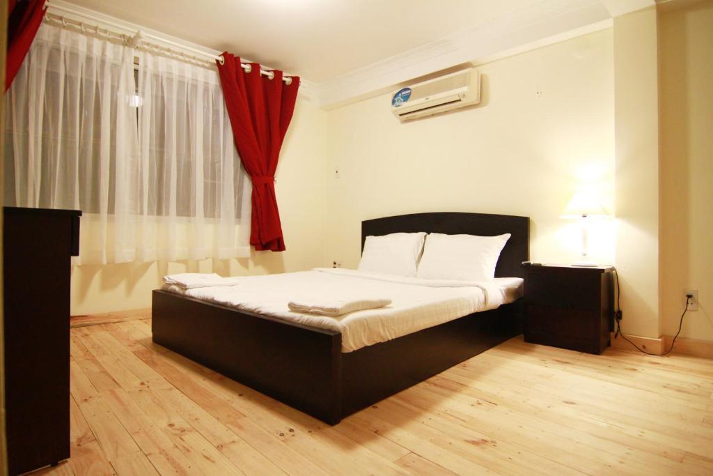 Koniko Backpackers Hostel Хошимин Номер фото