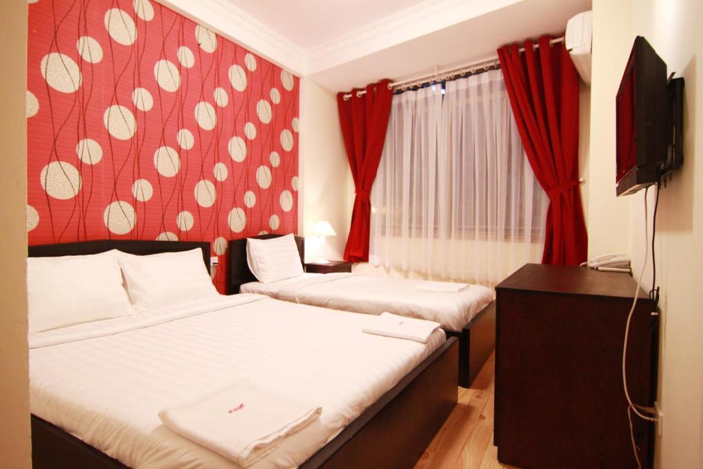 Koniko Backpackers Hostel Хошимин Номер фото